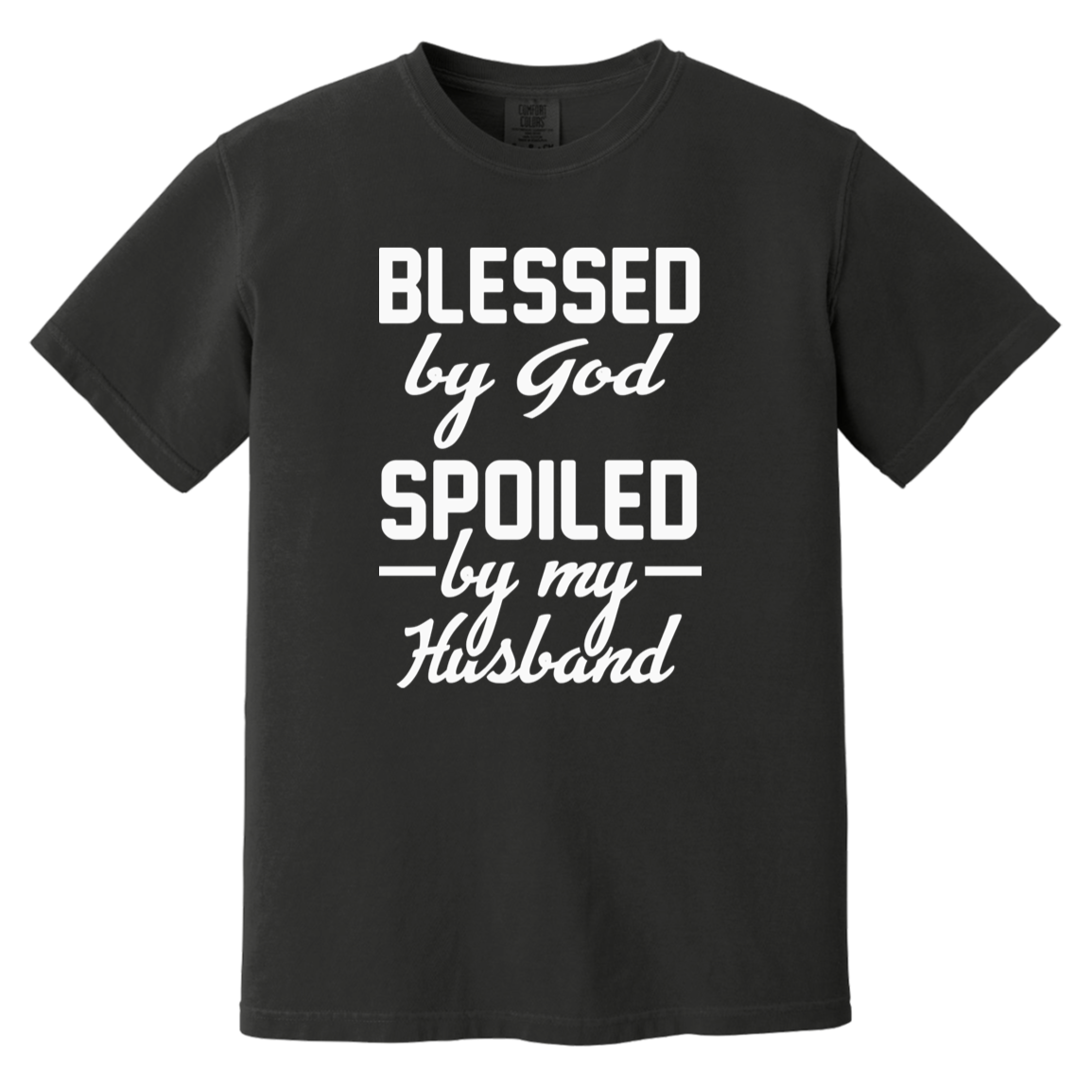 Black heavyweight garment-dyed cotton tee with "Blessed by God, Spoiled by My Husband" text design, made from 100% USA cotton.