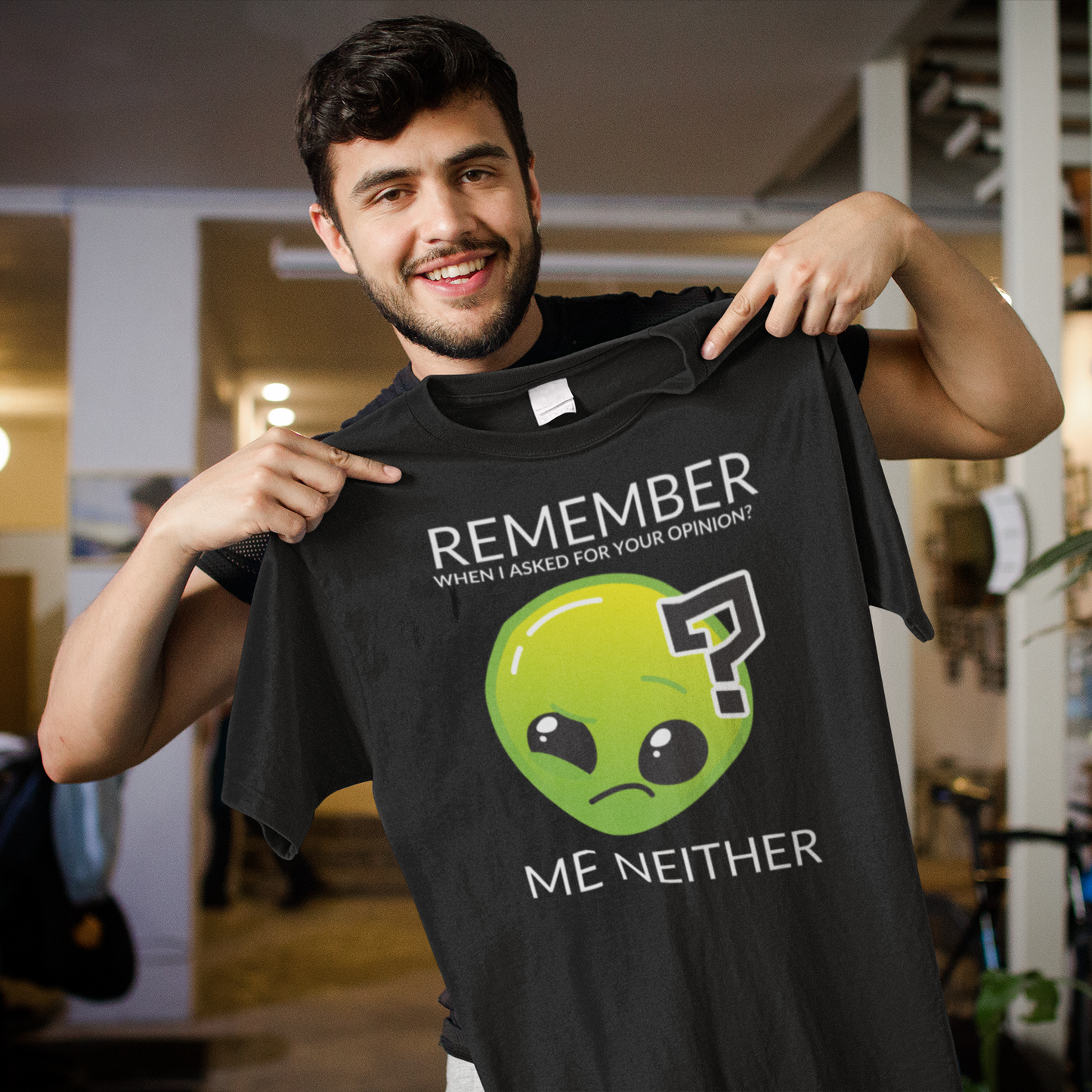 Black heavyweight garment-dyed cotton t-shirt featuring humorous quote 'Remember when I asked for your opinion?... me neither' with alien graphic of Roswell