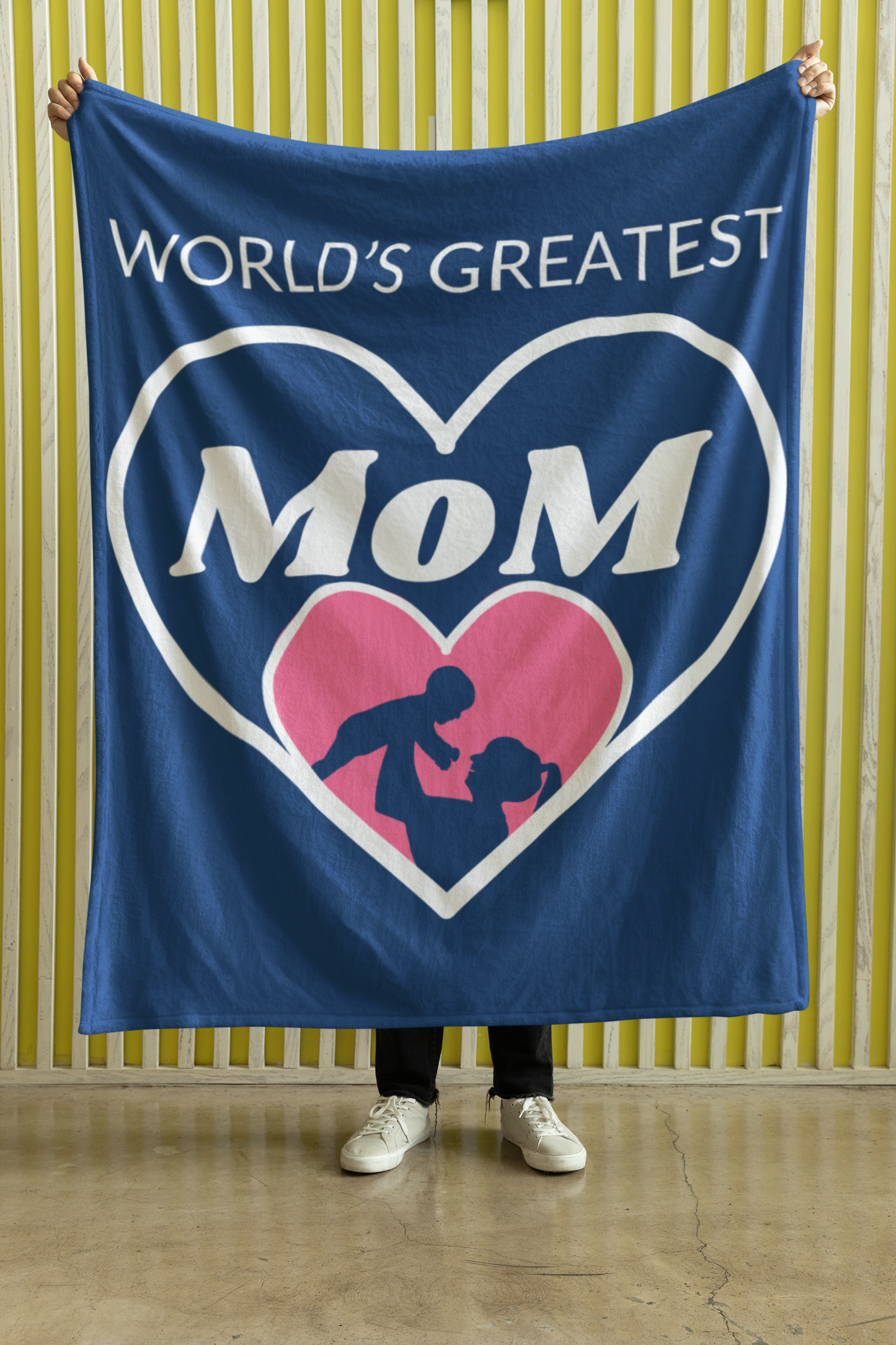 World's Greatest Mom royal blue premium black sherpa blanket featuring a silhouette of a mother and child inside a pink heart, surrounded by another heart.