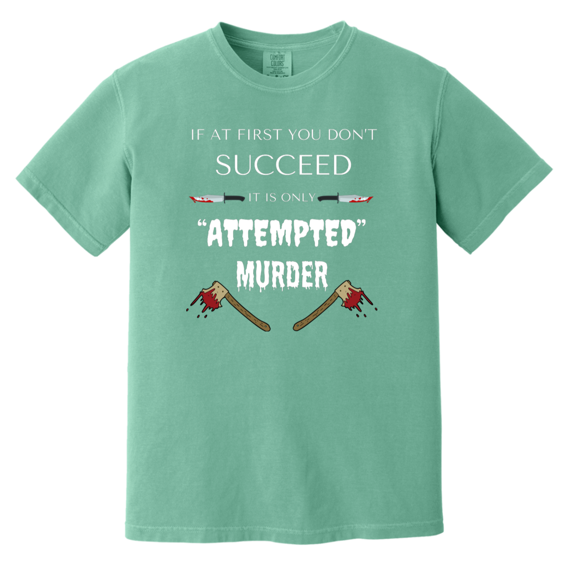 seafoam heavyweight garment-dyed cotton t-shirt featuring humorous quote 'If at first you don't succeed, it is only attempted murder' with images of bloody knives and axes