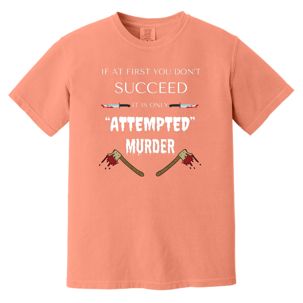 terracotta heavyweight garment-dyed cotton t-shirt featuring humorous quote 'If at first you don't succeed, it is only attempted murder' with images of bloody knives and axes